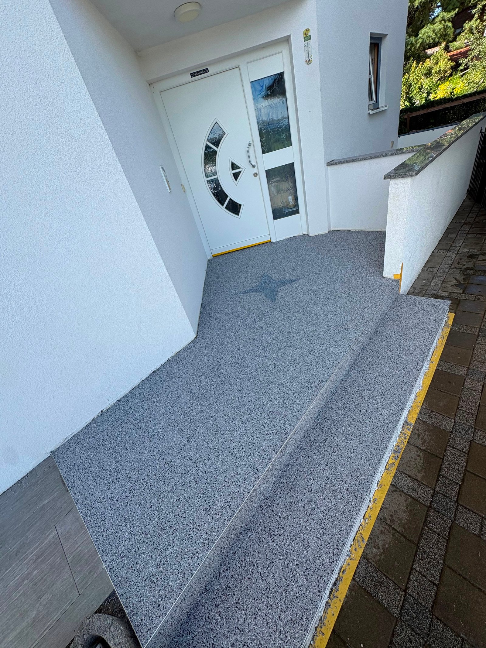 Steinteppich Eingangsbereich mit Treppe